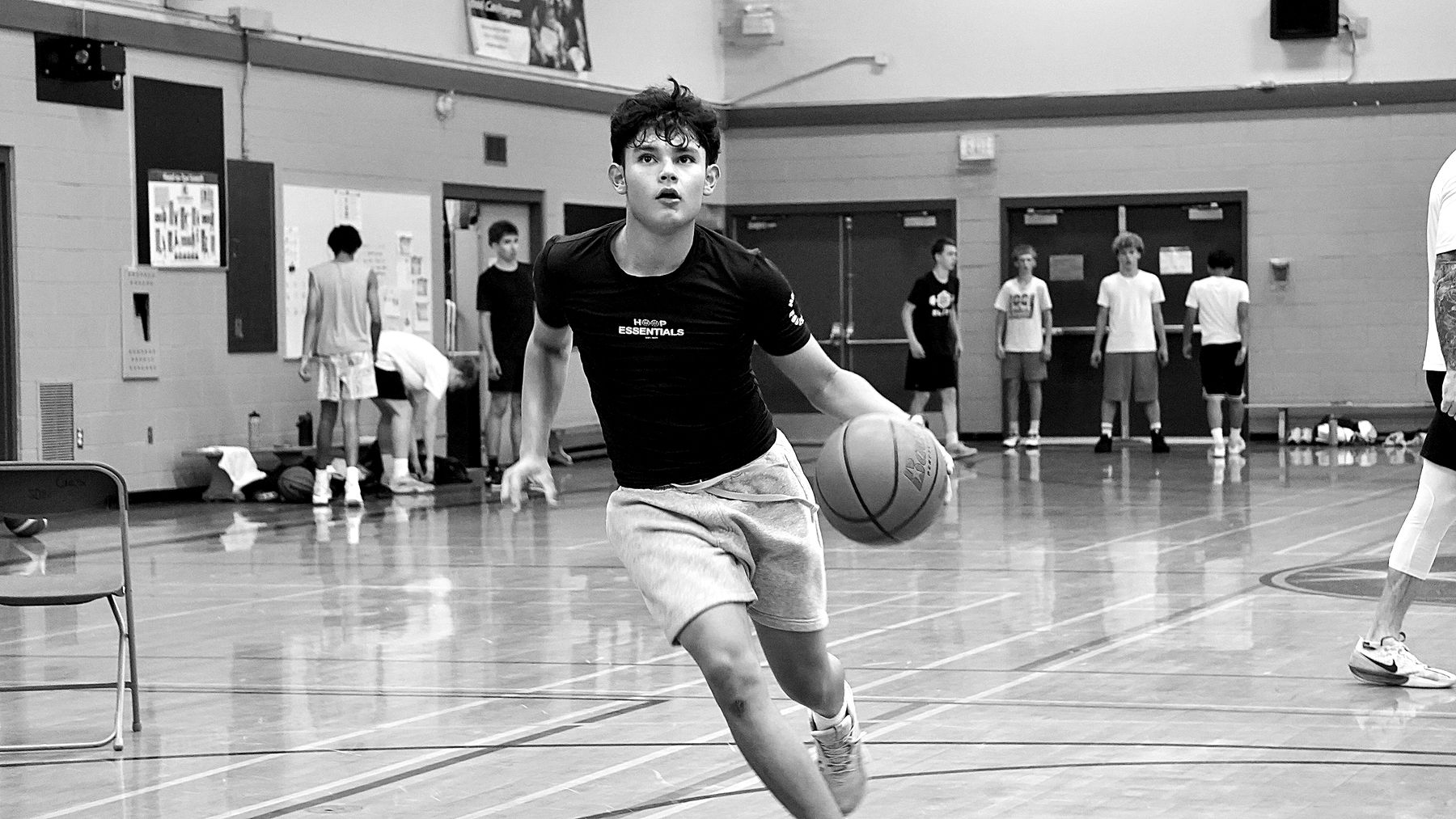 A player attacks downhill on a crossover dribble
